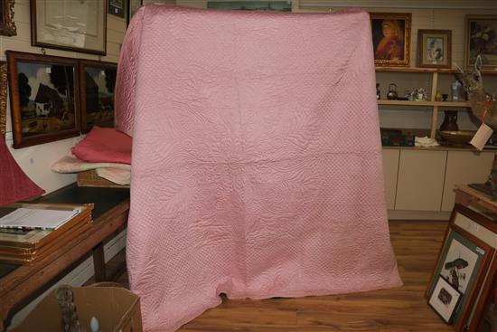 A rose pink and light pink reversible quilt, another reversible with yellow, the other mint green gingham and pink (3)